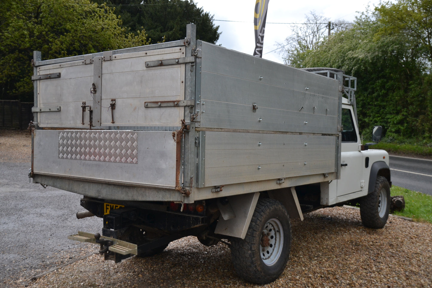 SOLD Defender 130 TD5 Tipper High sided with log/chipper partions