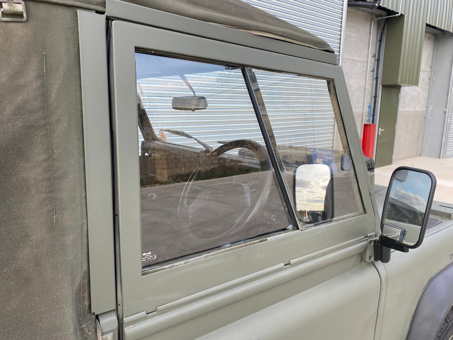 SOLD Defender 110 ex-Military Soft-Top 1993 2.5D